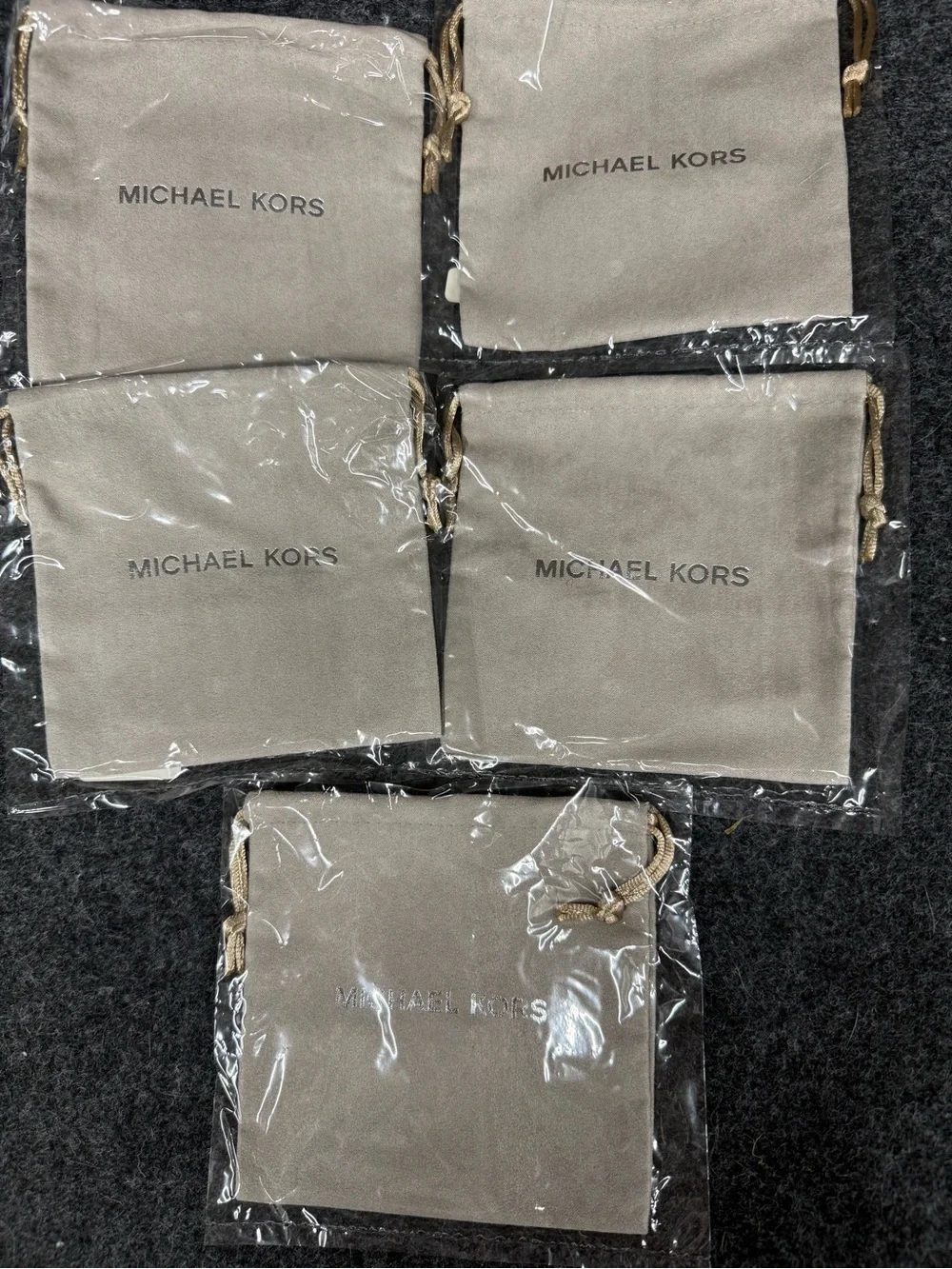 NEW Michael Kors Beige Drawstring Jewelry Pouches With Silver Logo - Set of 5